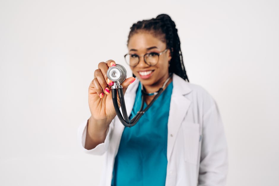 A cheerful female doctor with a stethoscope, promoting healthcare positivity.